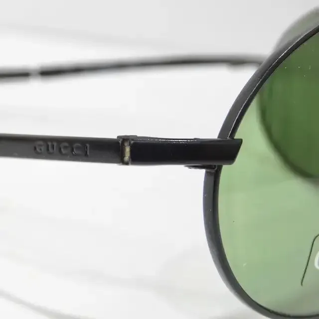 Gucci 1990s Black/Green Lense Sunglasses