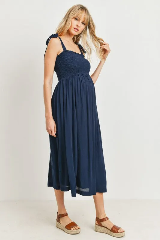 Women's navy blue rayon smocked maternity & post natal flowy midi dress with adjustable tie straps