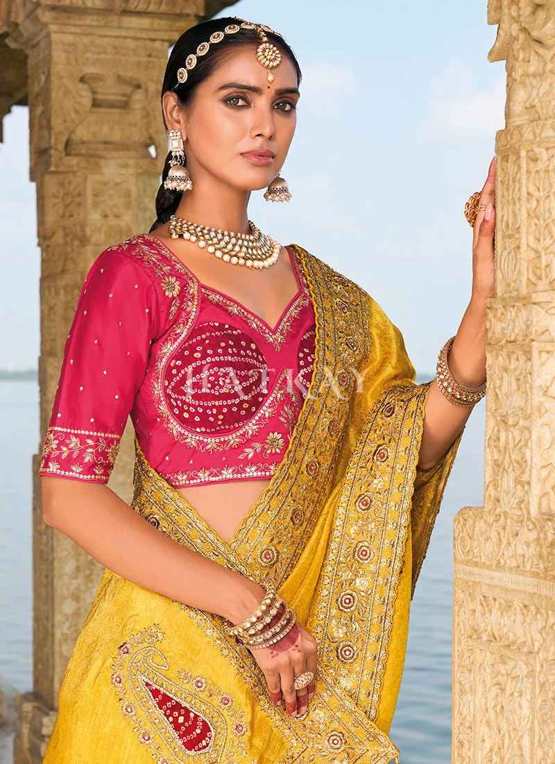 Yellow And Magenta Handwork Embroidery Wedding Saree