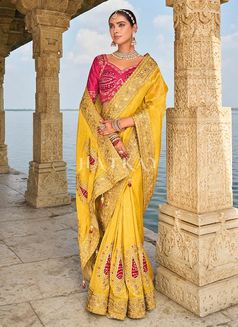 Yellow And Magenta Handwork Embroidery Wedding Saree